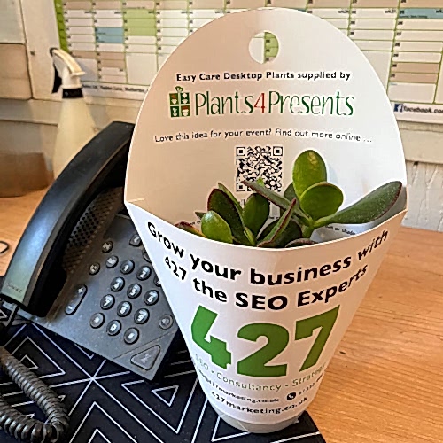 plants in promotional carry home sleeves