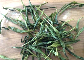 dry the homegrown tea leaves in a low oven